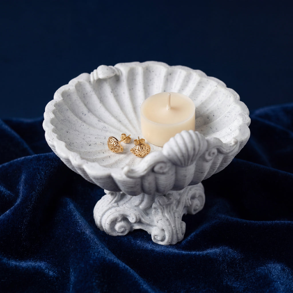 Coast-er seashell jewellery tray with candle and gold earrings
